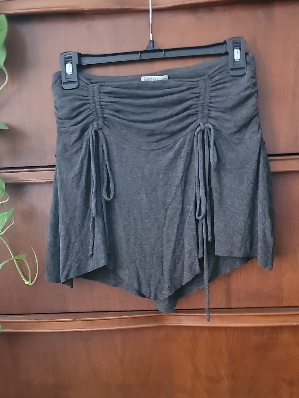EARTHBOUND Festival Asymmetrical Ruched Drawstring Mini Skirt in Charcoal.